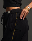 Woman modeling dance pants in Black