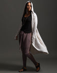 Woman modeling white aion duster