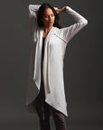 Woman modeling white aion duster