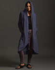 Woman modeling dark blue aion duster