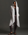 Woman modeling white aion duster