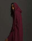 Woman modeling bordeaux aion duster