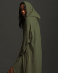 Woman modeling urban forest aion duster