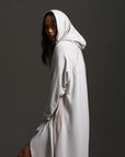 Woman modeling white aion duster