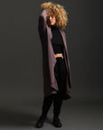 Woman modeling lavender aion duster