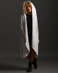 Woman modeling white aion duster
