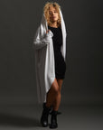 Woman modeling white aion duster