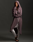 Woman modeling lavender aion duster