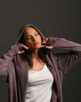 Woman modeling lavender aion duster