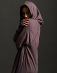 Woman modeling lavender aion duster