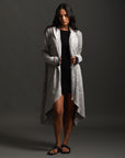 Woman modeling mineral grey aion duster