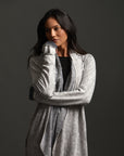 Woman modeling mineral grey aion duster