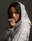 Woman modeling mineral grey aion duster