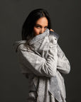 Woman modeling mineral grey aion duster