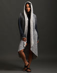 Woman modeling mineral grey aion duster