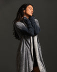 Woman modeling mineral grey aion duster