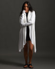 Woman modeling white aion duster