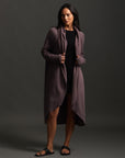 Woman modeling lavender aion duster