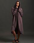Woman modeling lavender aion duster