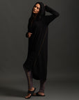 Woman modeling black aion duster