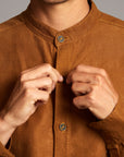 Male modeling Shacket in Whiskey Haze