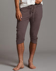 Male modeling Brazen colored yogo mid pants