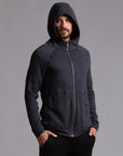 Male modeling dark blue zip tree hoodie