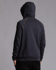 Male modeling dark blue zip tree hoodie