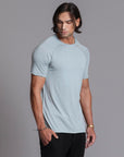 Male modeling agave teal ultimate tee shirt