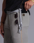 A man modeling Deep Clay gray colored jogger pants