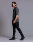 A man modeling black colored jogger pants