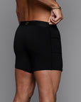 A man modeling the One Golden Thread Unders in Black