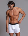 A man modeling the One Golden Thread Unders in White