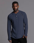 Male modeling blue long sleeve henley
