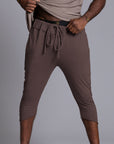 Male modeling Brazen colored yogo mid pants