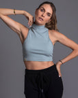 Woman modeling high neck crop in Agave