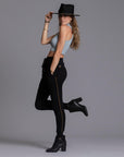 A woman modeling the One Golden Thread Jogga Pants in Black