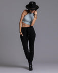 A woman modeling the One Golden Thread Jogga Pants in Black