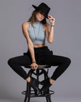 A woman modeling the One Golden Thread Jogga Pants in Black