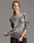 Woman modeling long sleeve crew shirt in rain cloud