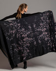 Woman modeling purple Benzova pattern nature wrap