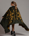 Woman modeling gold Benzova pattern nature wrap