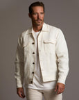 Male modeling white axis jacket