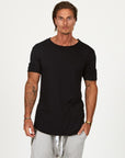Male modeling black crew neck shirt