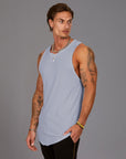 Man modeling a Clay blue tank top
