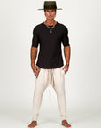 Male modeling White Stone colored pants