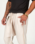 Male modeling White Stone colored pants