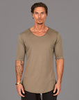 Male modeling tan v neck shirt
