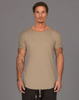 Male modeling tan crew neck shirt