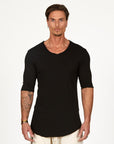 Male modeling black v neck shirt